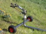 Turbine drive, effluent irrigation sprinkler with wheeled cart